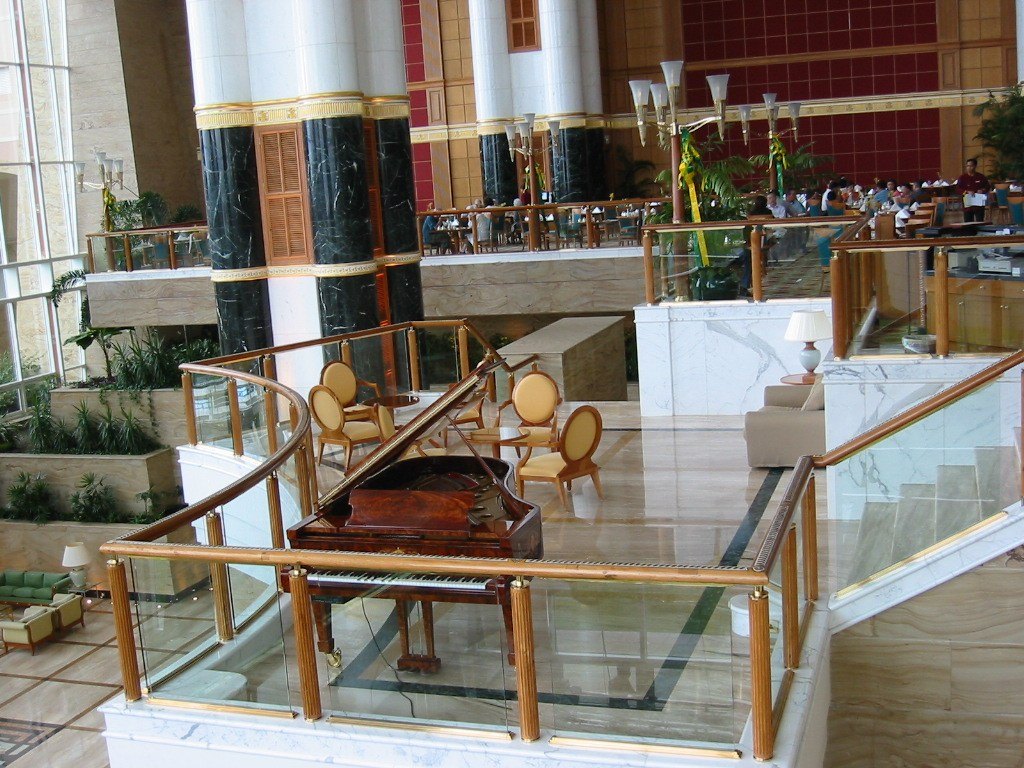 The piano overlooks the atrium and the main restaurant